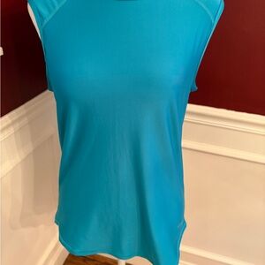 Vibrant Turquoise Sleeveless Rashguard by Sporti.